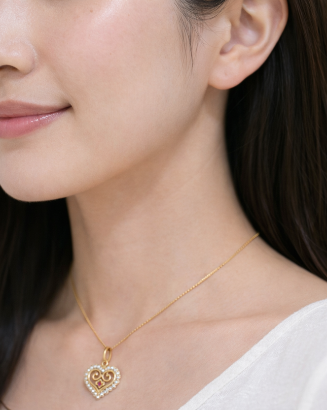 Rhodolite and Pearl Hmong Heart Necklace